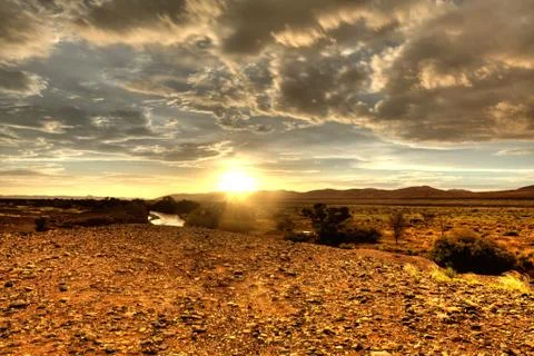 Desert sunset Stock Photos