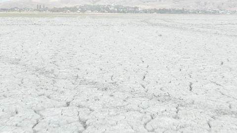 Desert surface filled web from cracks make the pattern on soil surface Pollution Stock Footage 113667827