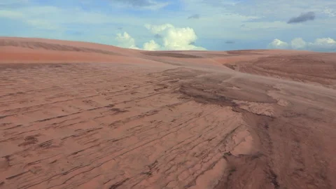 Desert terrain with intricate sand formations carved by natural elements. F.. Stockbeeldmateriaal 287247372