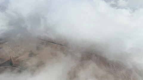 Desert through clouds Stock Footage 326165252