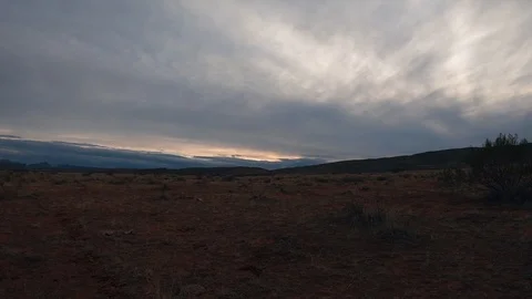 Desert time-lapse, clouds moving slowly, desert sunset Stock Footage 123003922