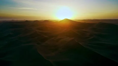 Desert under sunset, backlight aerial photography Stock Footage 329598865