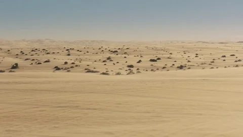 Desert with U.S Mexican border wall Stock Footage 72629527