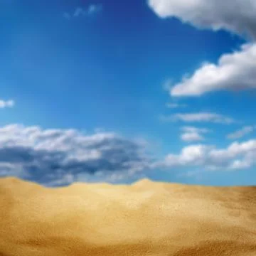 Desert with view blue sky with clouds in the background. The sky is clear a.. Stock Photos