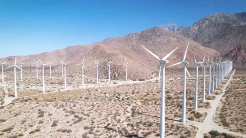 Desert Wind Turbines and Mountain Ridge, Palm Springs, Aerial Pass, 4K Stock Footage 197018297