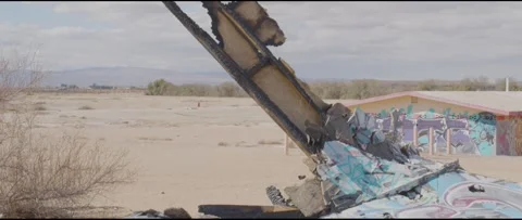 Desert Wreckage with Graffiti Stock-Footage 250590683