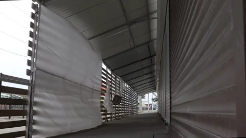 A deserted abandoned building is dramatically blown by the wind Stock Footage 156394175