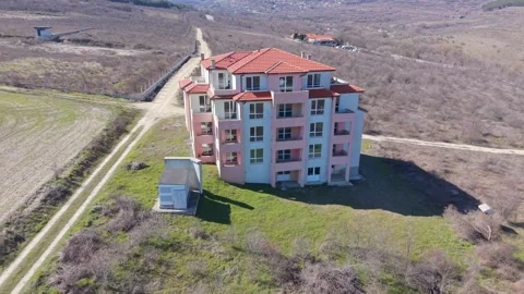 Deserted apartment complex aerial drone view abandoned residential buildings Видео 330769035