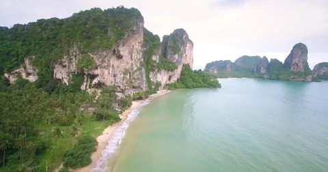 Deserted Beach and Rugged Cliffs at Ton Sai, Railay, Krabi, Thailand, Ascending Stock Footage 78661494