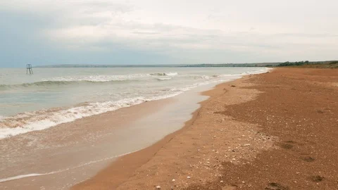  Deserted beach. Metal structure for diving offshore. Stock Footage 112607880