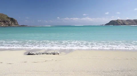 A deserted beach on the ocean Video stock 34636120