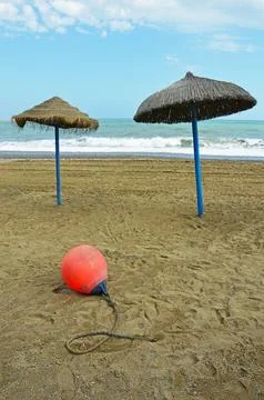 Deserted beach Stock Photos