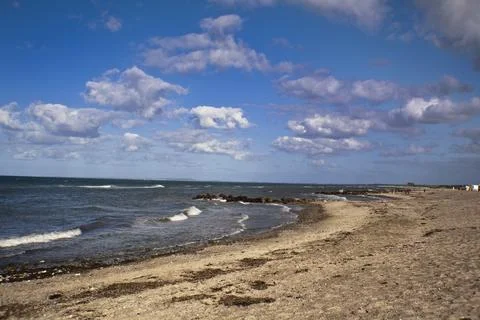 Deserted beach in summer Stock Photos