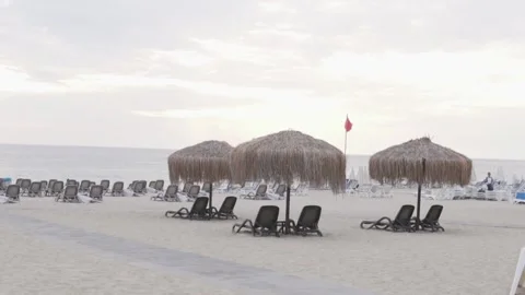 Deserted beach In Turkey on a cloudy autumn day, the Turret flag develops in the 스톡 동영상 164280199