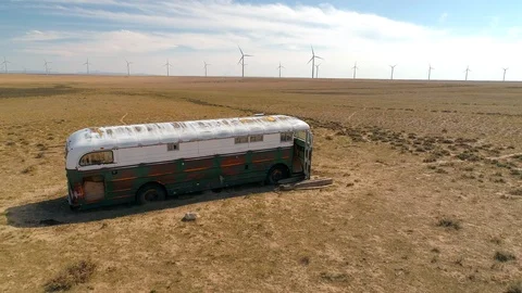 Deserted Bus by Windmill Farm Stock Footage 124712342
