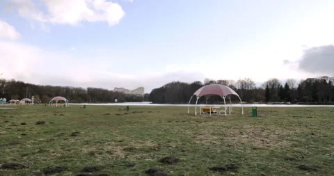 A deserted city beach in early spring. The snow has just come off the ground Stock Footage 238766923