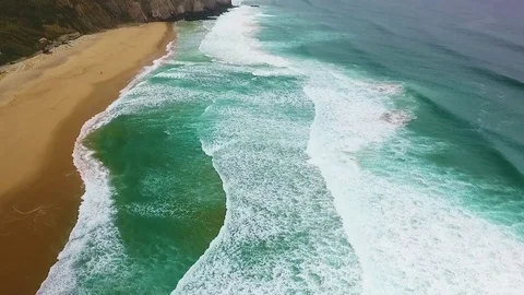 Deserted coast of the Atlantic Ocean in a cloudy autumn even Stock Footage 76839799