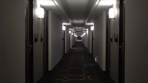A deserted corridor lined with hotel rooms. Stock Footage 335736205