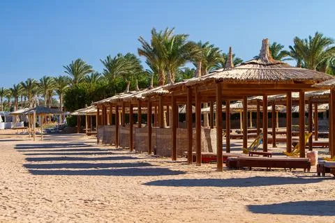 Deserted empty beach Stock Photos