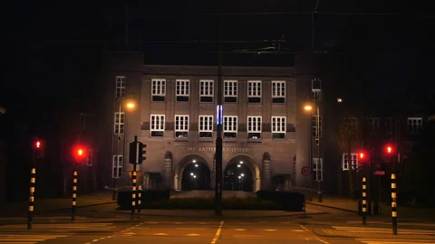 Deserted intersection at night during corona curfew. Amsterdam, Netherlands. Video stock 147944510