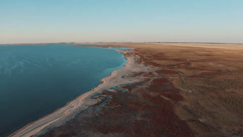 Deserted lake shore 스톡 동영상 249925612