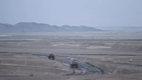 Deserted landscape with trucks Stock Footage 77045014