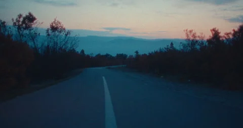 Deserted Road At Dusk With A Distant Mountain Range Stock Footage 301457628