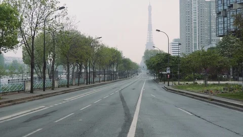Deserted road to Eiffel tower during coronavirus lockdown in Paris 4K Stock Footage 128385159