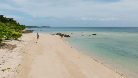 Deserted sandy beach with turquoise waters. Santa Fe, Tablas, Romblon Stock Footage 313287610
