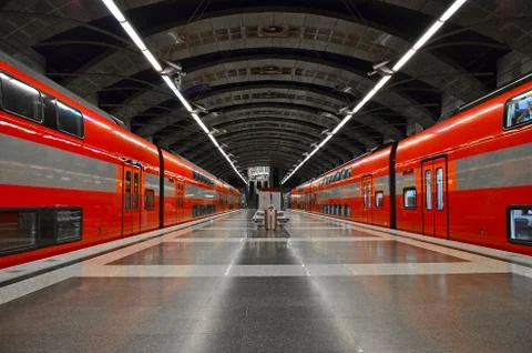 Deserted stopping platform of trains without people, trains are on the platform Stock-Fotos