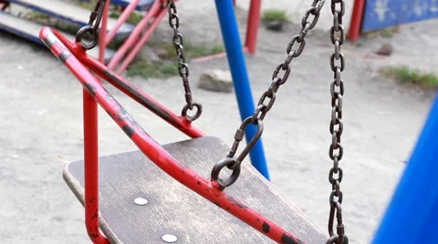 Deserted swings in a playground Stock Footage 52194945
