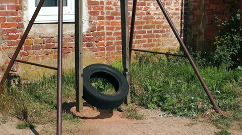 Deserted swings in a playground Video stock 57324799