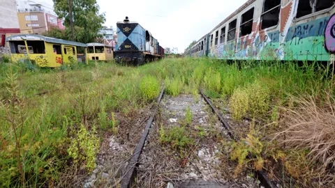 Deserted Train Storage Station Filled With Decaying Graffiti Cars Video stock 305878798