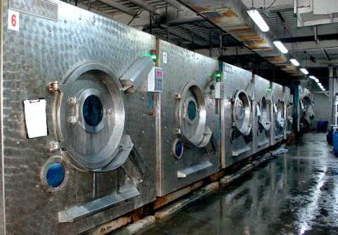 Deserted workshop of sewing and old washing machines Stock Photos