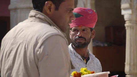 Deshnoke, India – June 20th: Man at Karni Mata Temple welcomes worshippers Video stock 285051739