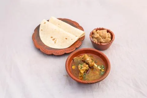Desi breakfast Mutton nalli nihari, Halwa and chapatti served in dish isola.. Stock Photos