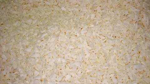 Desiccated Coconut Closeup Texture on Rotating Plate Stock Footage 113197720