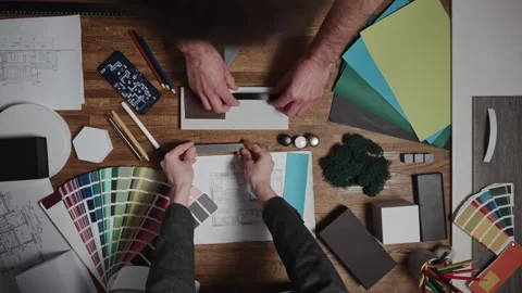 Design and architecture studio. Close-up, male and female hands of interior Stock Footage 294162566