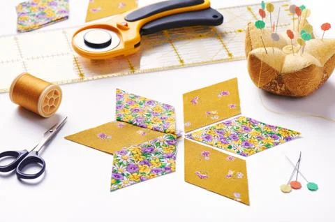 Design  element of  quilt in progress, prepared cut pieces and sew one around Stock Photos