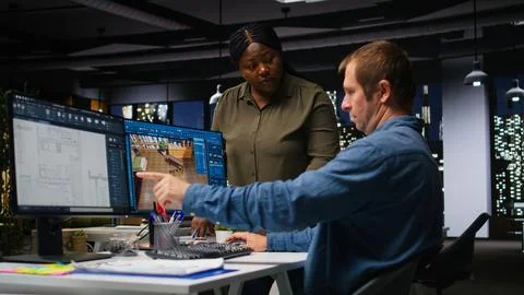 Design engineering team use architectural software for 3D modeling Stock Photos