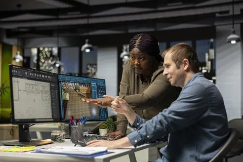 Design engineering team use architectural software for 3D modeling Stock Photos