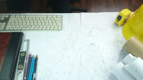 Design engineers discuss the project and make measurements Stock Footage 89938551