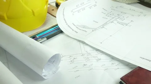 Design engineers discuss the project and make measurements Stock Footage 89941150