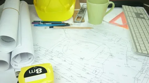 Design engineers discuss the project and make measurements Stock Footage 89941999