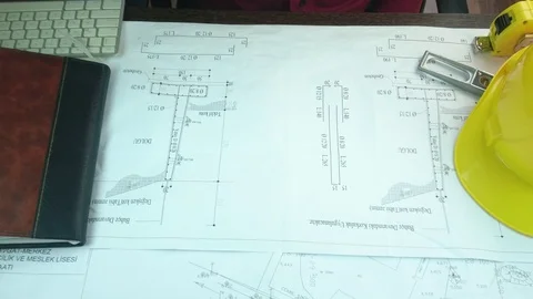 Design engineers discuss the project and make measurements Stock Footage 89972517