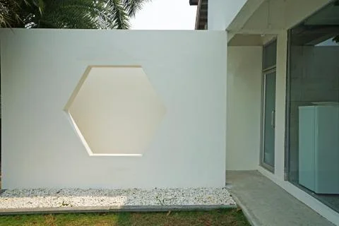 Design of Hexagonal window frame on white wall shade Stock Photos