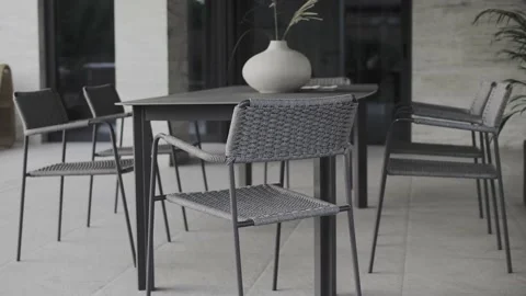 Design interior of dining area with a large table for whole family outside house Stock Footage 220773587