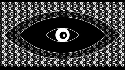 Design of a large eye pattern on a black background with smaller patterns a.. Stock Footage 332846343