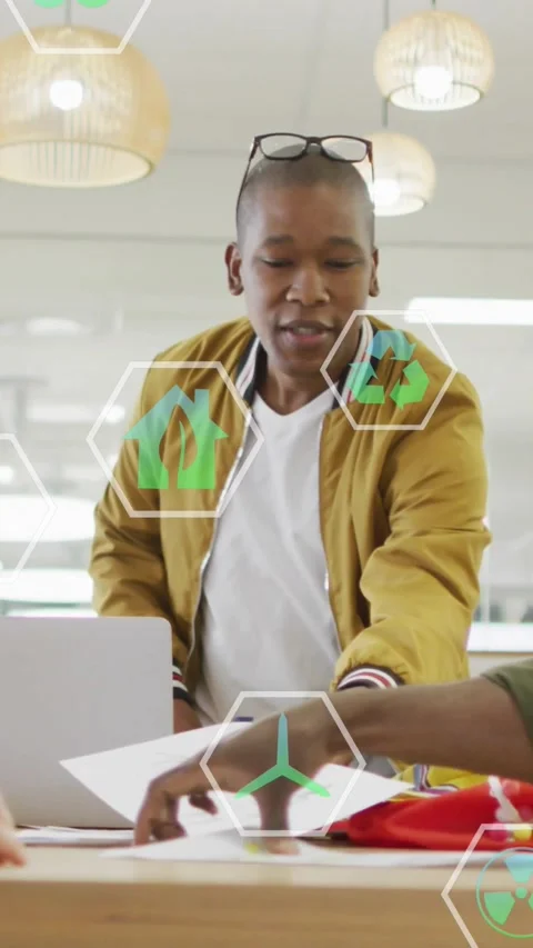 Design lead grabbing sheets, scanning samples and passing docs with eco icons Stock Footage 334598647