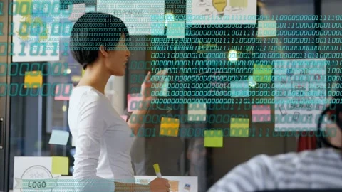 Design lead holding marker, engaging peer, turning to glass, arranging notes, Stock Footage 333155075